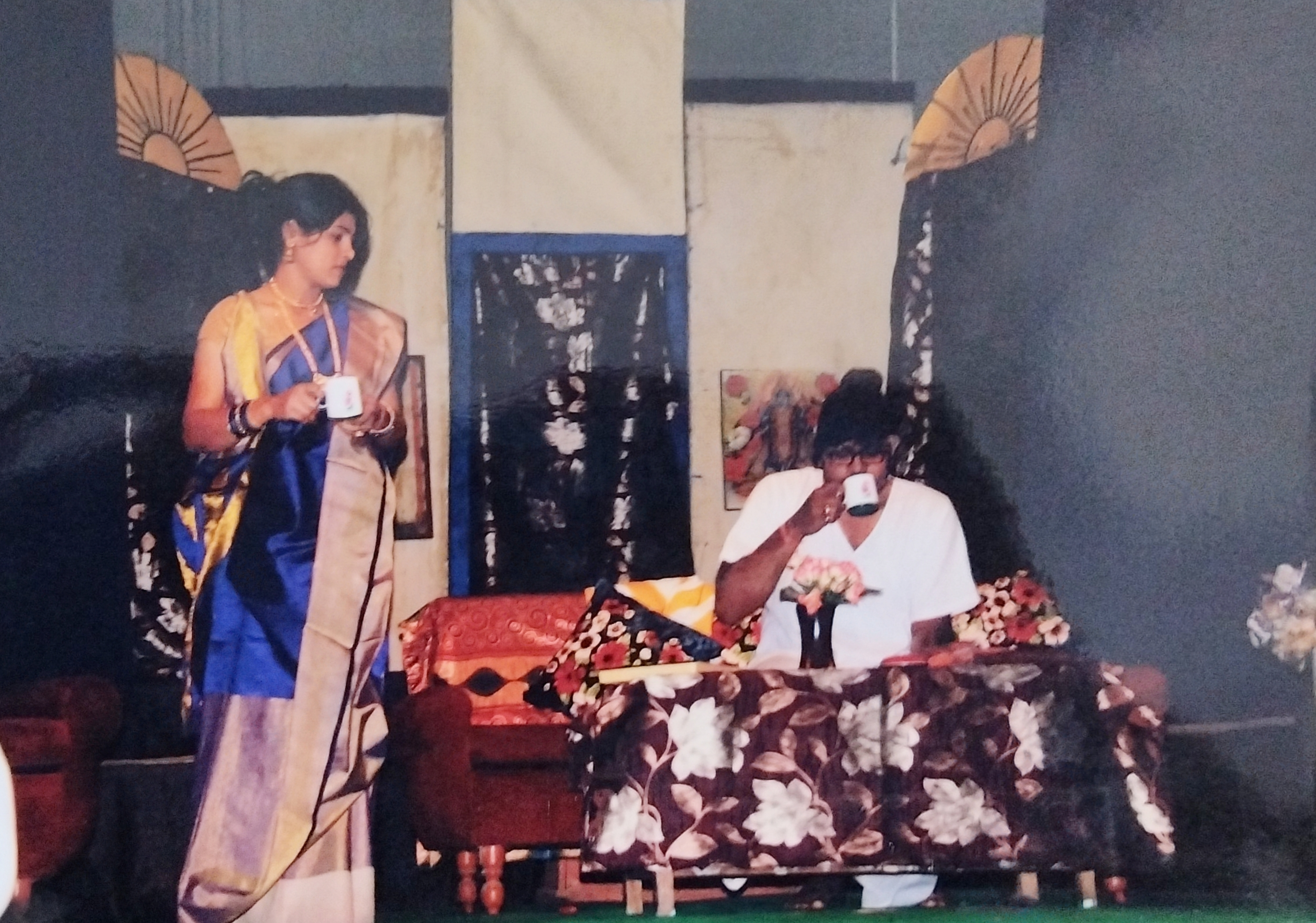 Actors performing a domestic realism stage play